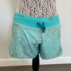 Patagonia workout shorts with tropical design